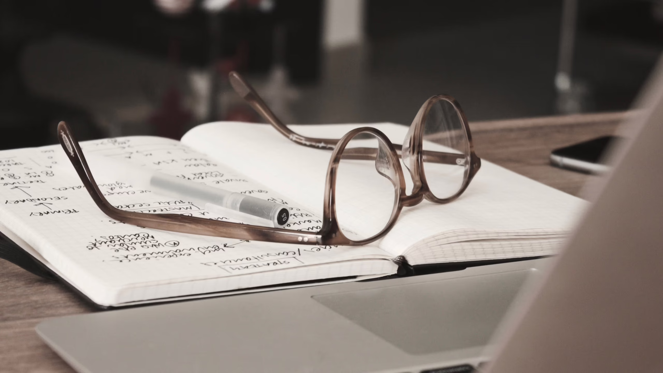 Notebook and glasses