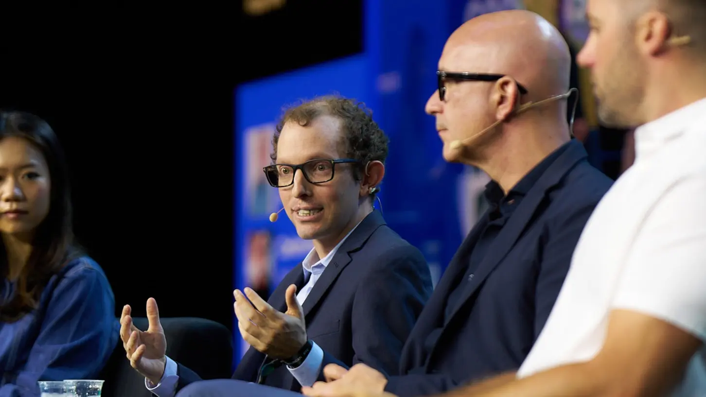 Nathan Allman sits on a panel at Consensus 2025