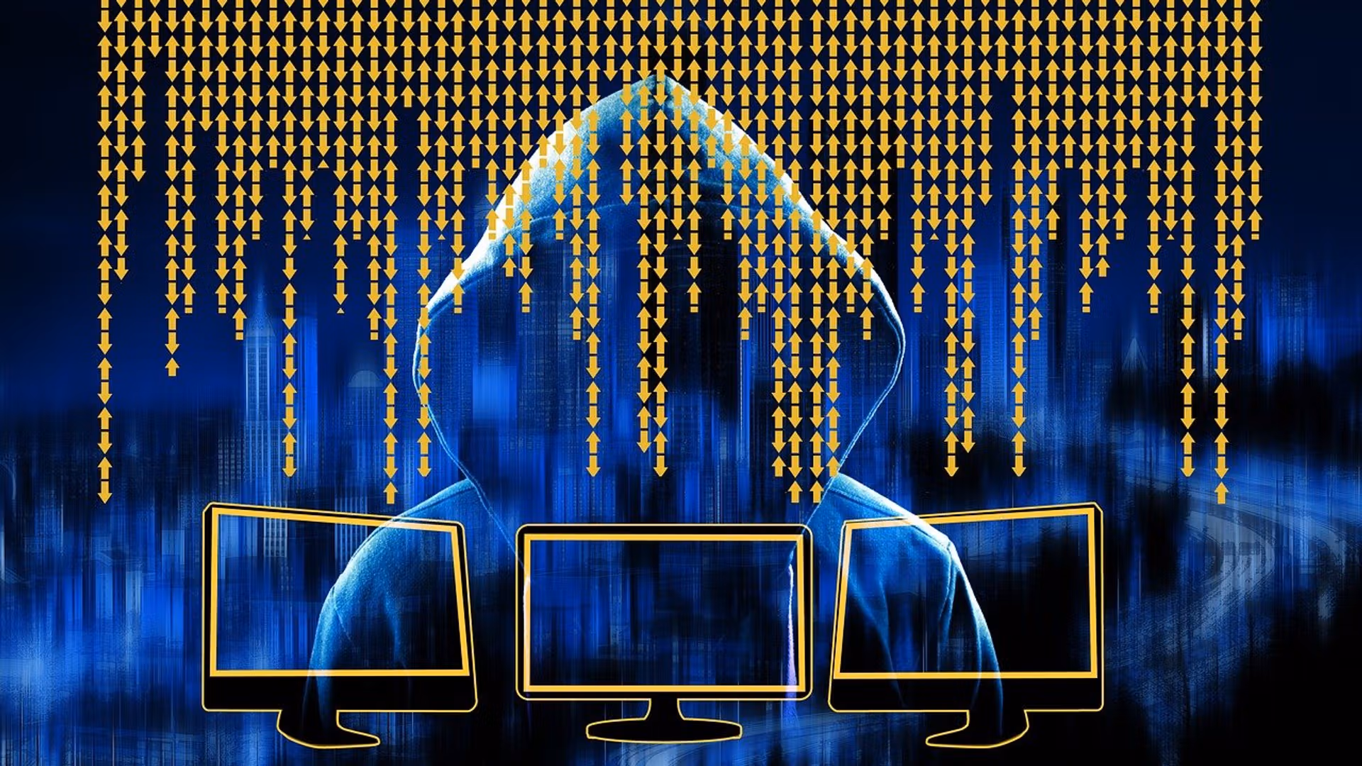 Silhouette image of a hooded figure behind three screens. (geralt/Pixabay)